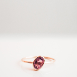 half round rose gold swirl ring with tourmaline