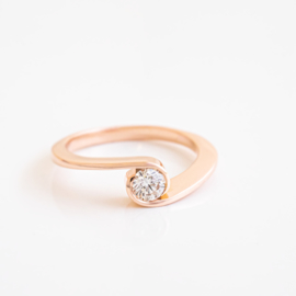 our red gold embrace solitaire engagement ring