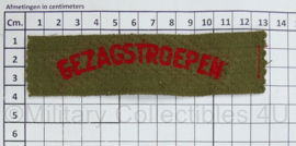 Straatnaam KL Gezagstroepen ongevouwen - gebruikt - 1944 tot 1945 - 13 x 3,5 cm - origineel