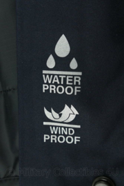 Nederlandse Politie donkerblauw undercover regenjack waterproof/windproof - maat dames 46 - nieuw - origineel