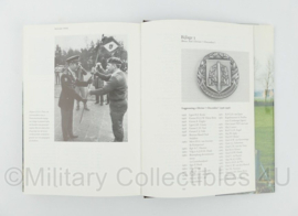 Boek De geschiedenis van 1 Divisie '7 December' 1946-1996