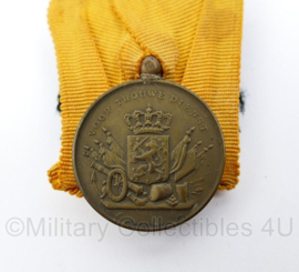 Defensie trouwe dienst voor 12 jaar trouwe dienst medaille uit periode  Koningin Juliana - origineel