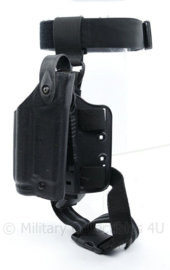 Eagle Industries koppel met Safariland leg panel en afkoppelbaar Glock 17 holster with light attached - origineel