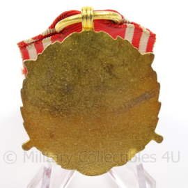 Poolse medaille 20 jaar trouwe dienst - afmeting 4 x 10,5 cm - origineel
