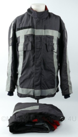 Nederlandse Brandweer Uitrukpak jas en broek donkerblauw met reflectie - huidig model - maat 27 - gedragen - origineel
