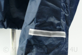 Politie regenjas Hampshire Constibulary volunteer police cadet - maat Large - licht gedragen - origineel