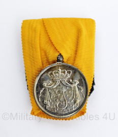 Defensie zilver trouwe dienst medaille uit periode  Koningin Juliana -  origineel