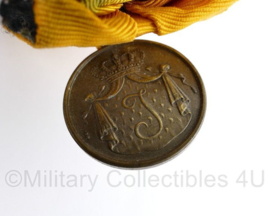 Defensie trouwe dienst voor 12 jaar trouwe dienst medaille uit periode  Koningin Juliana - origineel