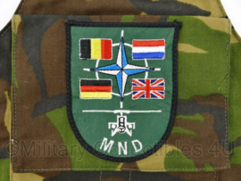 Defensie MND Woodland armband met klittenband voor embleem MND-C Monchengladbach The Multinational Division Central - 18,5 x 26 cm - origineel