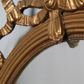 Antieke spiegel / Spiegel ovaal in goud met strikje bekroond ca. 1920 (No.411556)