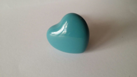 blauw hartvormig kast- of deurknopje.
