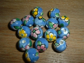 Mooie blauwe kralen met bloem 12 mm.