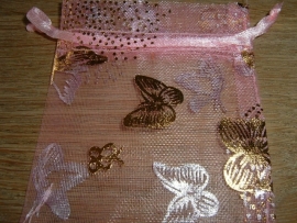 Mooie roze organza zakjes met vlindertjes