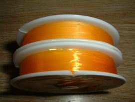 Elastisch nylondraad oranjegeel 0.6 mm.