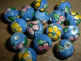 Mooie blauwe kralen met bloem 12 mm.