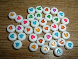 10 stuks Mooie ronde kralen met een gekleurd hartje mix