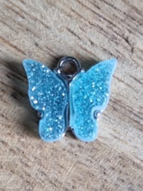 Bedel vlinder zilver Aqua blauw glitter