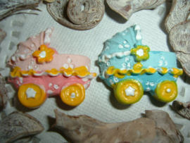 Roze en blauwe kinderwagens/wiegjes
