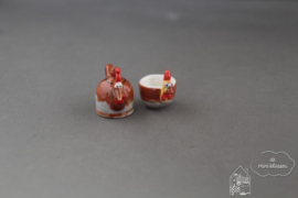 Theepot met kopje haan
