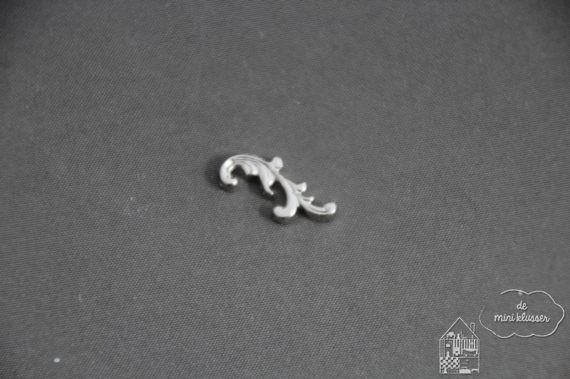 Metalen ornamentjes zilver