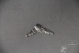 Metalen hoek ornament zilver