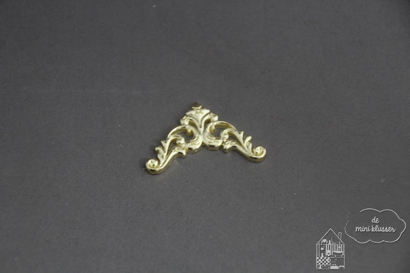 Metalen hoek ornament goud