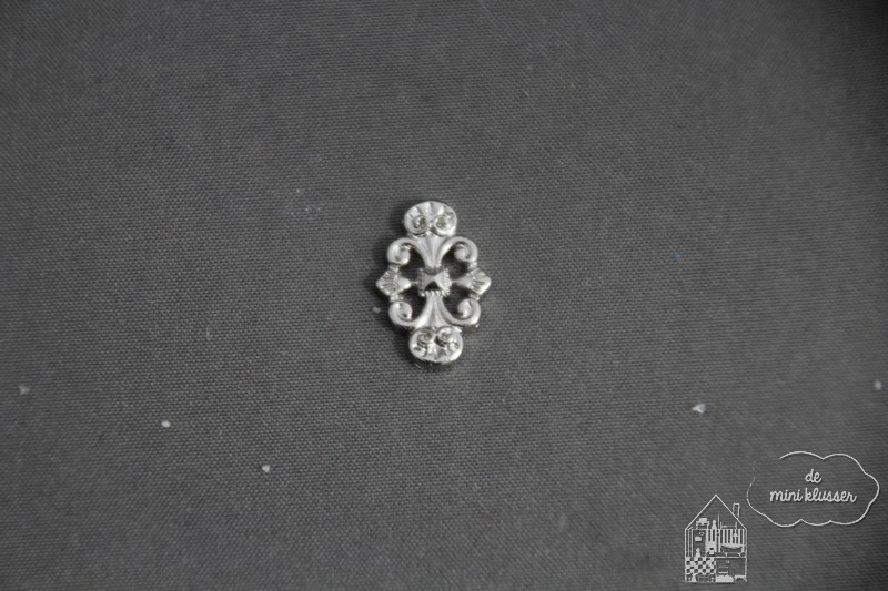 Metalen ornamentjes zilver