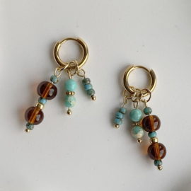 Idhuna Rvs Oorringen met Bedels Goud Kralen hangers Bruin en turquoise