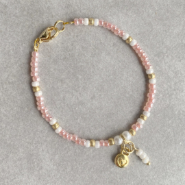 Roze Rocailles Kralen Kinderarmband met Rvs bedels