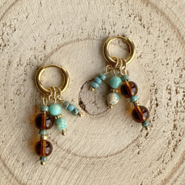 Idhuna Rvs Oorringen met Bedels Goud Kralen hangers Bruin en turquoise