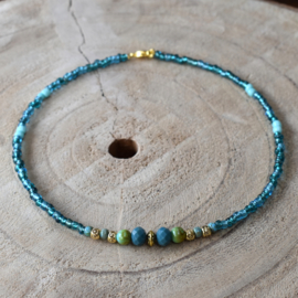 Korte kralen ketting dames turquoise & goud