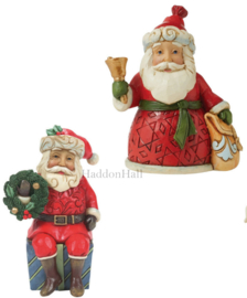 Santa Sitting on Gift & Santa with Bell - Set van 2 Jim Shore Mini Figurines retired *