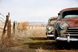 Papermoon Fotobehang Vintage Roestende Auto's