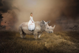 Papermoon Fotobehang Surrealistisch Meisje Op Neushoorn