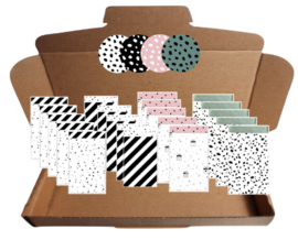 20 zakjes in 4 verschillende soorten en 20 stickers met stipjes in 4 verschillende kleuren.