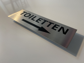 RVS deurplaatje, opschrift TOILETTEN & pijl rechts15x5cm