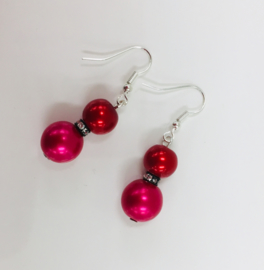 Pareloorbellen in warmrood en fuchsia, met kristal