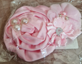 Schattige roze rozet