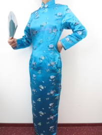 Fantastische lange turquoise Chinese jurk met mouwen bloesem motief