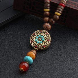 Nepalese geluksketting met rond amulet bloem