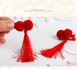Superleuk setje èchte chinese haarclips 2 rode bolletjes met kwastje