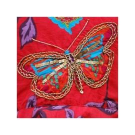 Geweldig rood puntenjurkje met glitters en muntjes rode vlinder