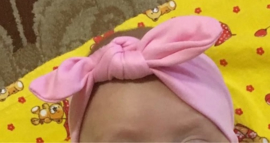 Superleuke haarband met strik effen roze kindermaat