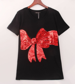 Leuk zwart shirt met grote strik van pailletten