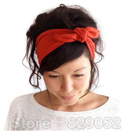 Superleuke haarband met strik effen oranje damesmaat