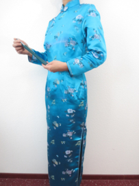Fantastische lange turquoise Chinese jurk met mouwen bloesem motief