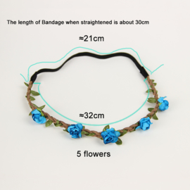 Leuke elastieken haarband met blauwe roosjes
