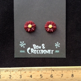 Bow and Crossbones, Burgundy Daisy Flower Stud Earrings.