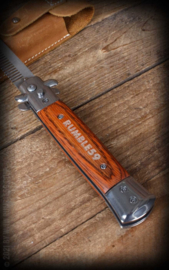 Rumble 59, Switchblade Comb with Leather Case.