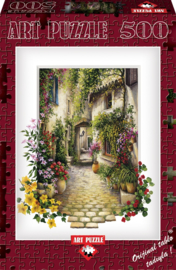 Art Puzzle 4189 - Village Alley in Full Bloom - 500 stukjes